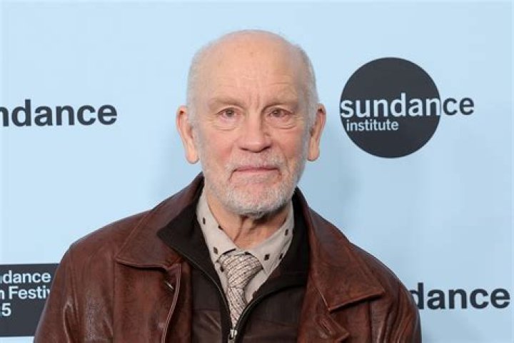In the midst of raging gay rumors, John Malkovich’s Personal Details Reflect His Wife/Partner!